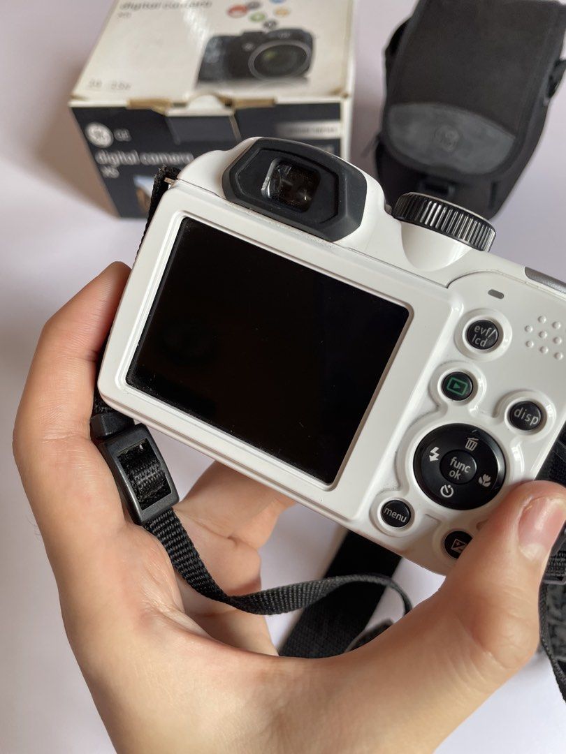 [WORKING] GE Power Series X5 Digital Camera with Case and Box (Category: Cameras) located in Las Pinas. Submitted by ultravioletlove (Listing ID 1463589096, Image 2). Description: FIXED PRICE Swipe to see flaws Sample photos on the last slide - GE X5 Digital Camera - Includes original box - Comes with GE branded camera case - Neck strap included - Lens has minor dust specks.