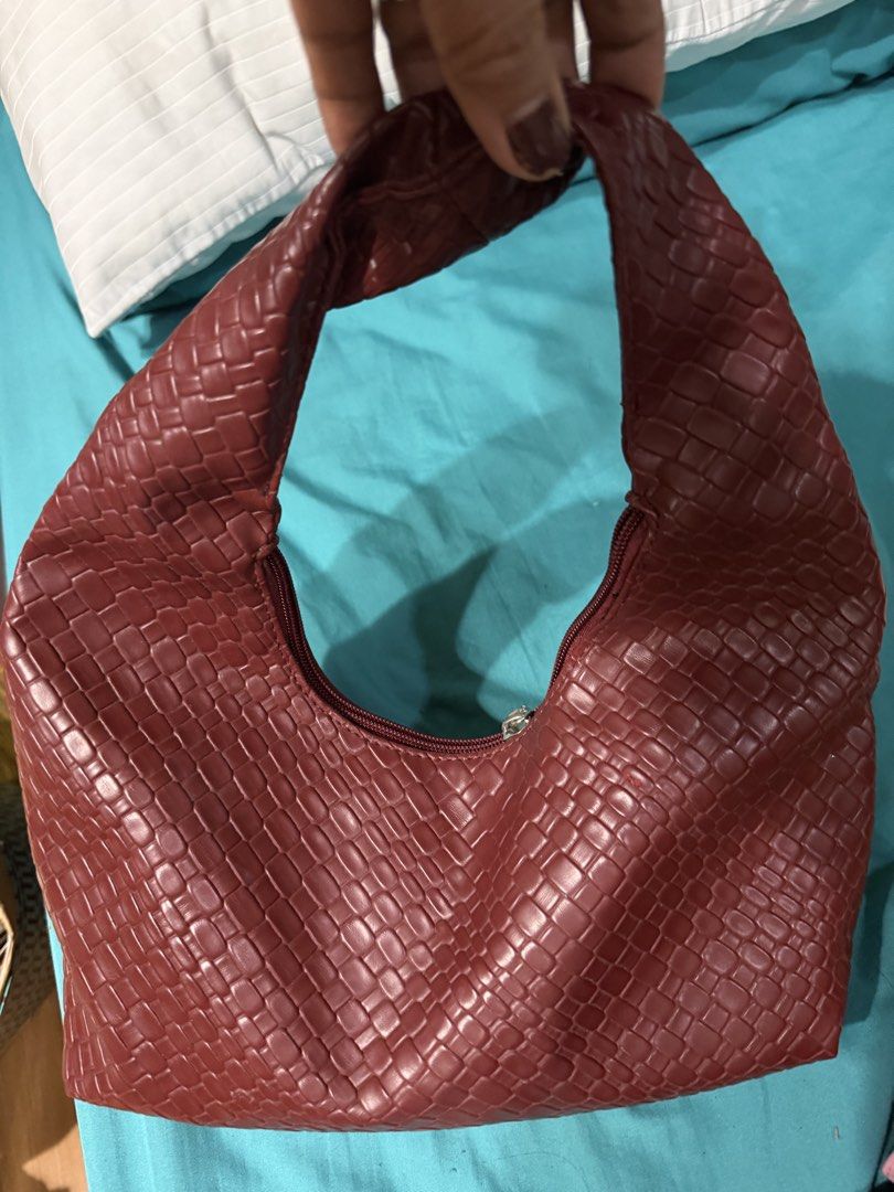 Woven Textured Shoulder Bag - burgundy (Category: Shoulder Bags) located in Quezon City. Submitted by r2wph (Listing ID 1463698738, Image 2). Description: Cool red shoulder bag. It has a woven texture all over. Zipper closure. The shape is a bit slouchy and hobo-like. Great for everyday use. Fits essentials. Handle is comfortable to hold..