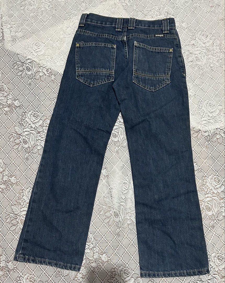 Wrangler Boys' Regular Fit Jeans Size 10 (Category: Babies & Kids Fashion) located in Plaridel. Submitted by ilovebubu28 (Listing ID 1463637849, Image 2). Description: - Brand: Wrangler - Size: 10 Regular Fit - Color: Dark Wash Denim - Features: Adjustable garterized waist for a snugger fit - Origin: Made in Mexico - Ideal for: Everyday wear Length 31.5” .