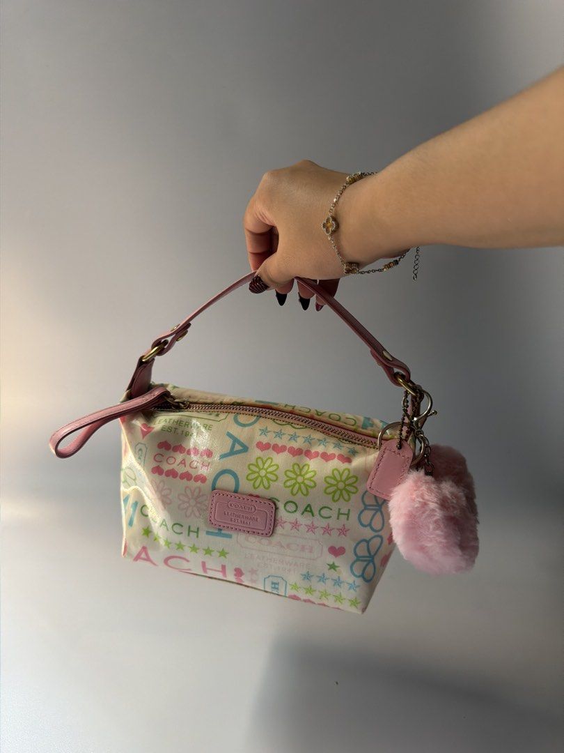 (RESERVED VIA LA) Y2K Coach Multicolor Graffiti Mini Bag (Category: Shoulder Bags) located in Mandaluyong City. Submitted by n444m (Listing ID 1463612159, Image 2). Description: Y2K Coach Multicolor Graffiti Mini Bag -still negotiable -w free charm.
