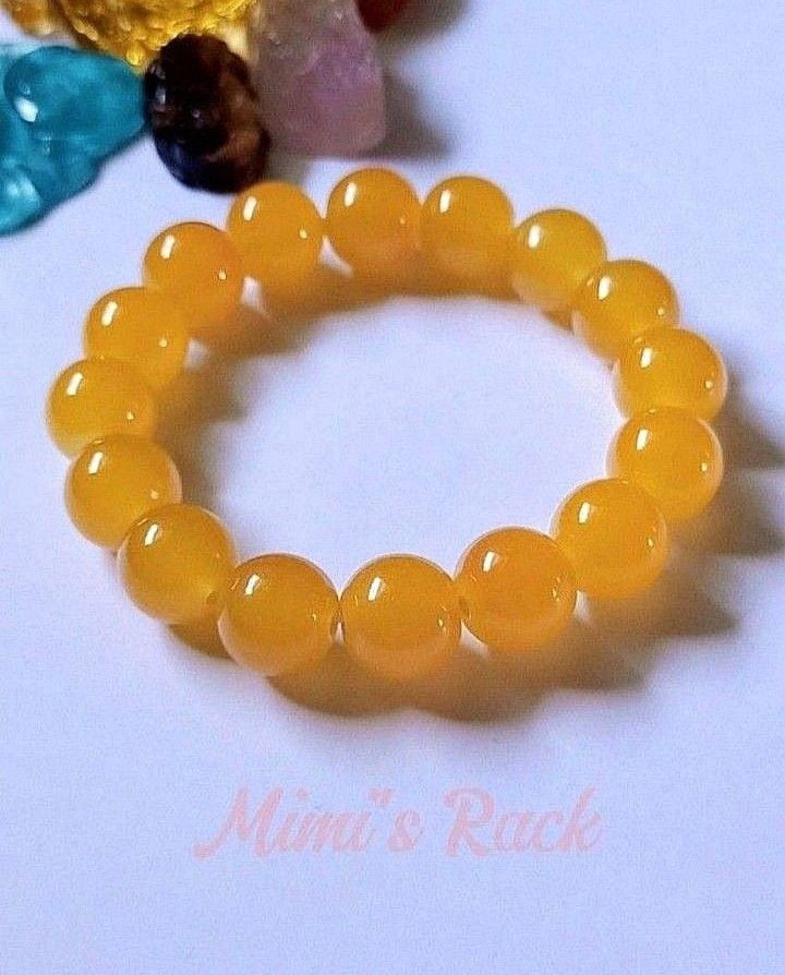 YELLOW AGATE BRACELET ROUND 12MM (Category: Bracelets) located in Taguig. Submitted by mimisrack (Listing ID 1463638628, Image 3). Description: 💛Bright confidence bracelet with bold, uplifting energy -Yellow Agate symbolizes positivity, confidence, and personal power -Encourages optimism and motivated action -Promotes emotional balance and steady decision-making -Smooth polished finish with warm golden glow -Associated with attracting good luck 