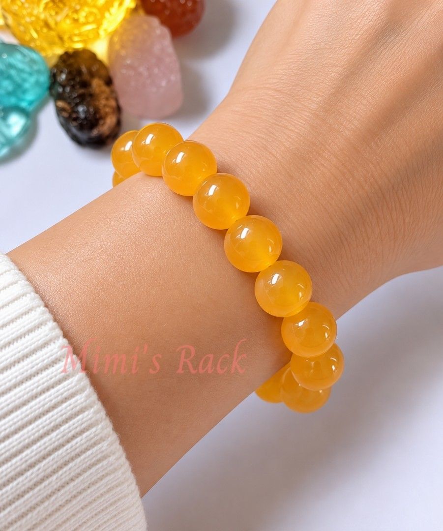 YELLOW AGATE BRACELET ROUND 12MM (Category: Bracelets) located in Taguig. Submitted by mimisrack (Listing ID 1463638628, Image 1). Description: 💛Bright confidence bracelet with bold, uplifting energy -Yellow Agate symbolizes positivity, confidence, and personal power -Encourages optimism and motivated action -Promotes emotional balance and steady decision-making -Smooth polished finish with warm golden glow -Associated with attracting good luck 