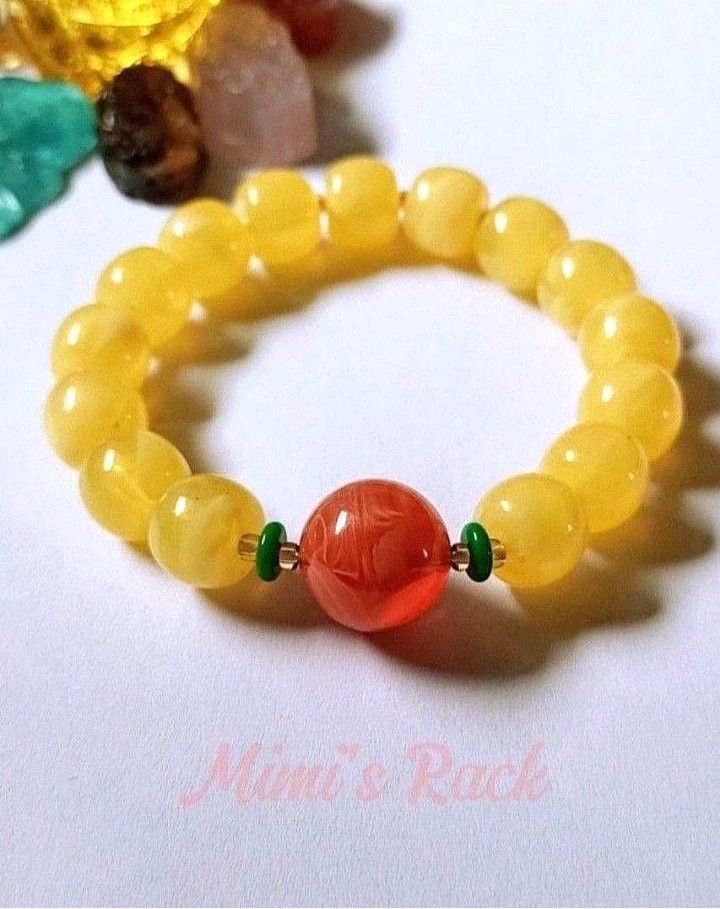 YELLOW AND ORANGE BEESWAX AMBER BRACELET (Category: Bracelets) located in Taguig. Submitted by mimisrack (Listing ID 1463639752, Image 3). Description: 💛Warm radiant energy bracelet blending sunshine and fiery vitality -Yellow Beeswax Amber symbolizes warmth, positivity, and uplifting energy -Orange Amber tones represent creativity, courage, and joyful motivation -Associated with protection and attracting good fortune -Balanced mix of calm confi