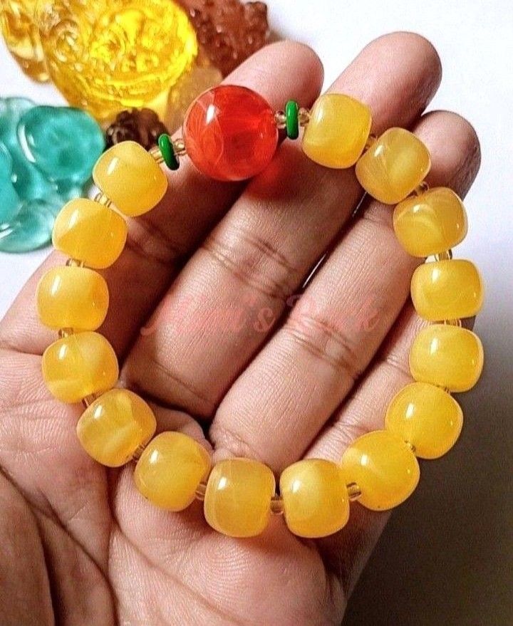 YELLOW AND ORANGE BEESWAX AMBER BRACELET (Category: Bracelets) located in Taguig. Submitted by mimisrack (Listing ID 1463639752, Image 2). Description: 💛Warm radiant energy bracelet blending sunshine and fiery vitality -Yellow Beeswax Amber symbolizes warmth, positivity, and uplifting energy -Orange Amber tones represent creativity, courage, and joyful motivation -Associated with protection and attracting good fortune -Balanced mix of calm confi