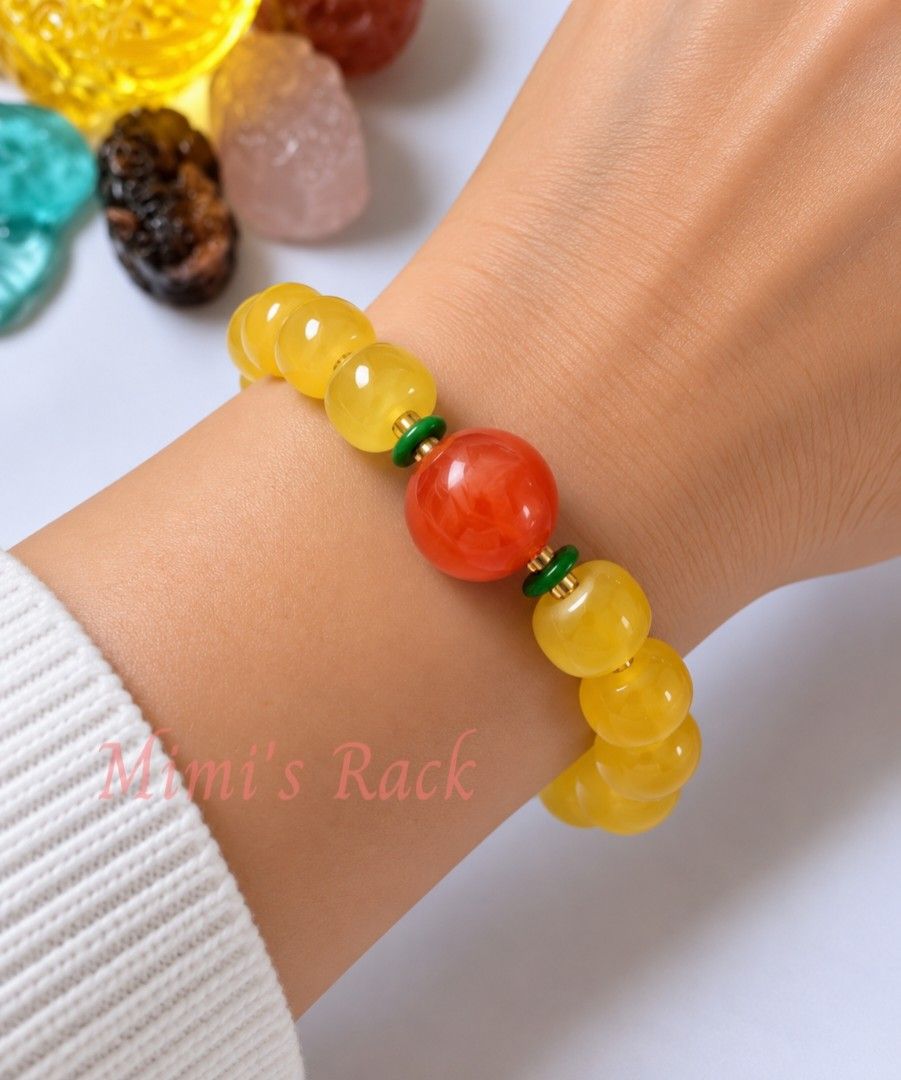 YELLOW AND ORANGE BEESWAX AMBER BRACELET (Category: Bracelets) located in Taguig. Submitted by mimisrack (Listing ID 1463639752, Image 1). Description: 💛Warm radiant energy bracelet blending sunshine and fiery vitality -Yellow Beeswax Amber symbolizes warmth, positivity, and uplifting energy -Orange Amber tones represent creativity, courage, and joyful motivation -Associated with protection and attracting good fortune -Balanced mix of calm confi