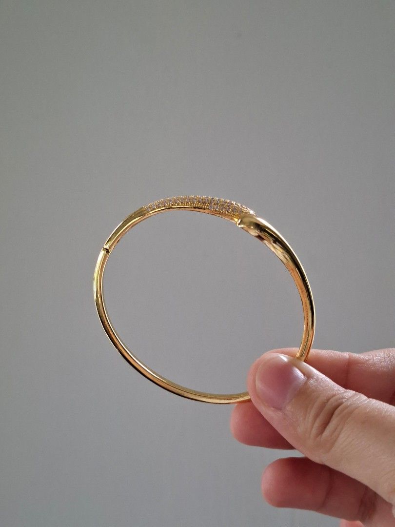 Yin Yang Gold Bangle Bracelet (Category: Bracelets) located in Dasmarinas. Submitted by danabrie22 (Listing ID 1463582078, Image 2). Description: brand new - stainless steel - cubic zirconia stones 10/10 condition from Hongkong.