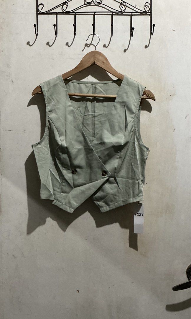 YOZY OVERLAP VEST TOP (Category: Sleeveless) located in Dagupan City. Submitted by trendies_collection (Listing ID 1463717458, Image 2). Description: Brand new with pouch and hang tag Large only No issue.