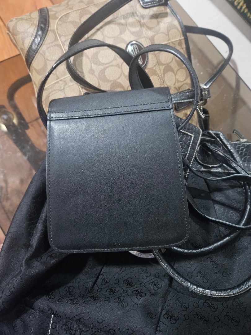 YSL sling (Category: Luxury Bags & Wallets) located in Zamboanga. Submitted by clayd052 (Listing ID 1463661741, Image 2). Description: NGA issue .: some minimal scratch leather.