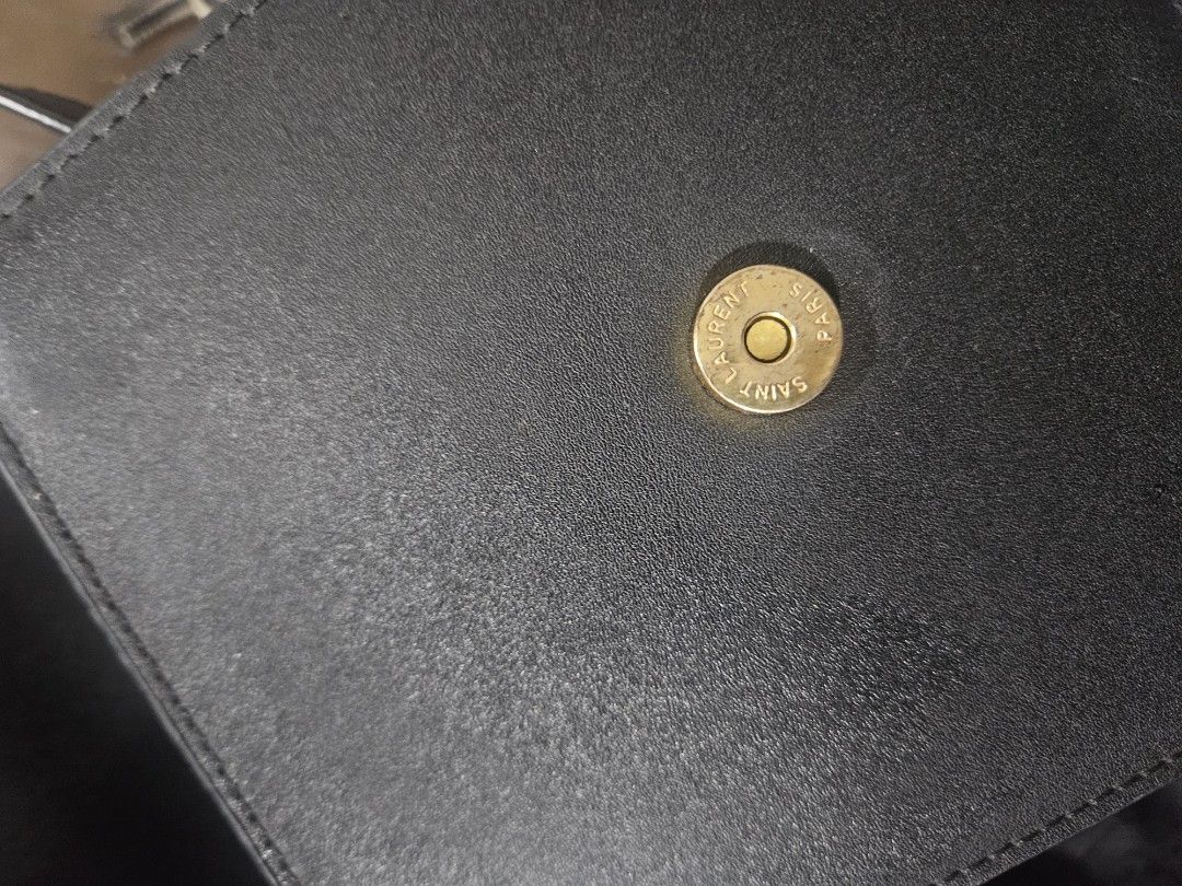 YSL sling (Category: Luxury Bags & Wallets) located in Zamboanga. Submitted by clayd052 (Listing ID 1463661741, Image 3). Description: NGA issue .: some minimal scratch leather.