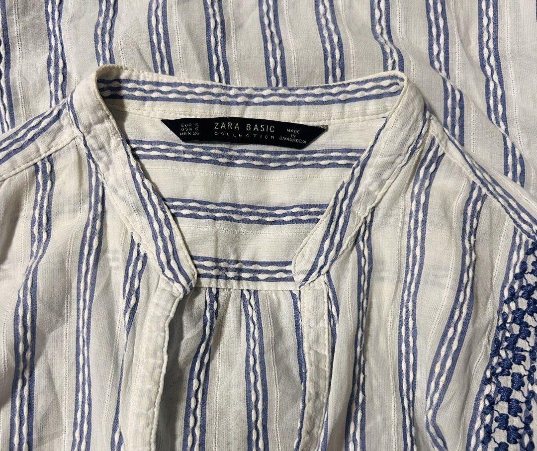 ZARA (Category: Blouses) located in Davao. Submitted by sart0ria85 (Listing ID 1463713809, Image 3). Description: A vertical stripes of white and blue long sleeves. 100% COTTON MADE IN BANGLADESH 🇧🇩 SMALL. Size 4 VERY GOOD CONDITION (87/100).