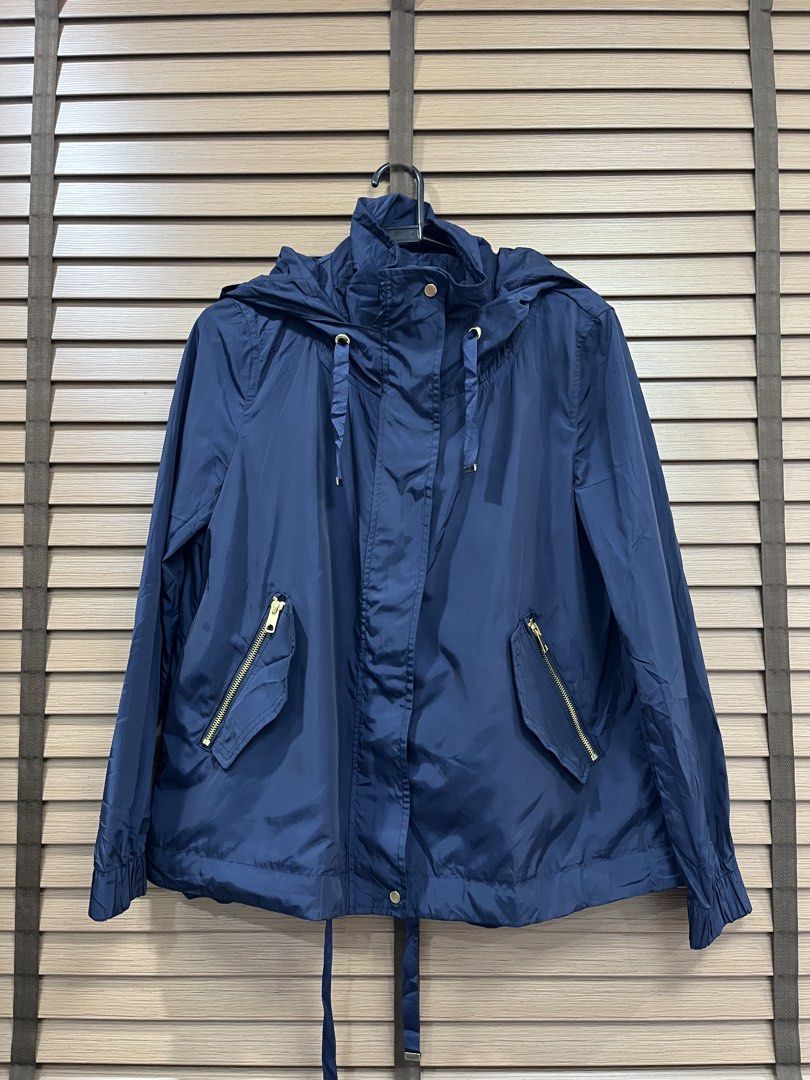 Zara Basic Outerwear Navy Blue Hooded Jacket (Category: Coats, Jackets and Outerwear) located in Mabalacat. Submitted by fashionclothesph (Listing ID 1463695740, Image 1). Description: - Navy blue Zara Basic hooded jacket - Size: Medium (M) - Lightweight material, ideal for layering - Gold zipper details on pockets and front - Adjustable drawstring at hood and hem - Pampanga Location - Addtl Shipping fee.