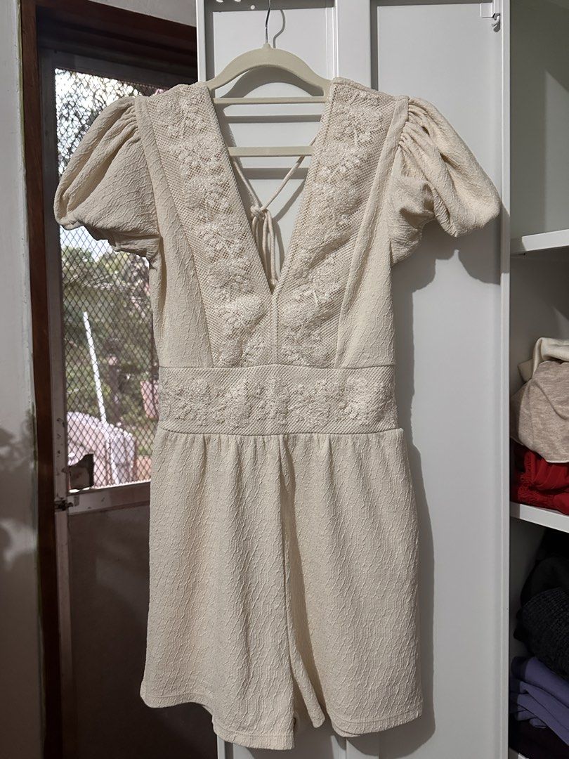 Zara Cream Textured Puff Sleeve Playsuit (Category: Rompers) located in Caloocan City. Submitted by tiannnaaa (Listing ID 1463684672, Image 1). Description: - fixed price posted, won’t reply to hagglers Zara cream textured playsuit - Features puff sleeves and a tie-up V-neckline - Delicate lace detail on the bodice and waist - Comfortable elasticated waist - Short shorts design - Ideal for casual wear or beach getaways.