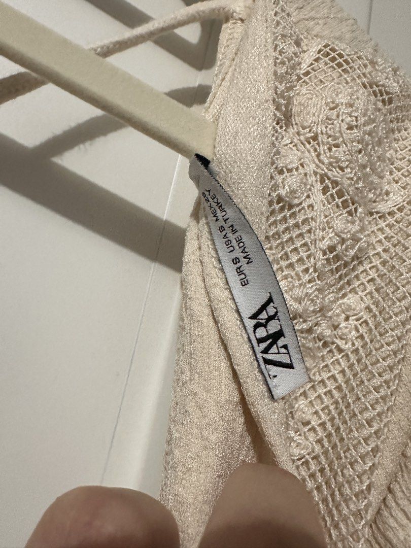 Zara Cream Textured Puff Sleeve Playsuit (Category: Rompers) located in Caloocan City. Submitted by tiannnaaa (Listing ID 1463684672, Image 2). Description: - fixed price posted, won’t reply to hagglers Zara cream textured playsuit - Features puff sleeves and a tie-up V-neckline - Delicate lace detail on the bodice and waist - Comfortable elasticated waist - Short shorts design - Ideal for casual wear or beach getaways.