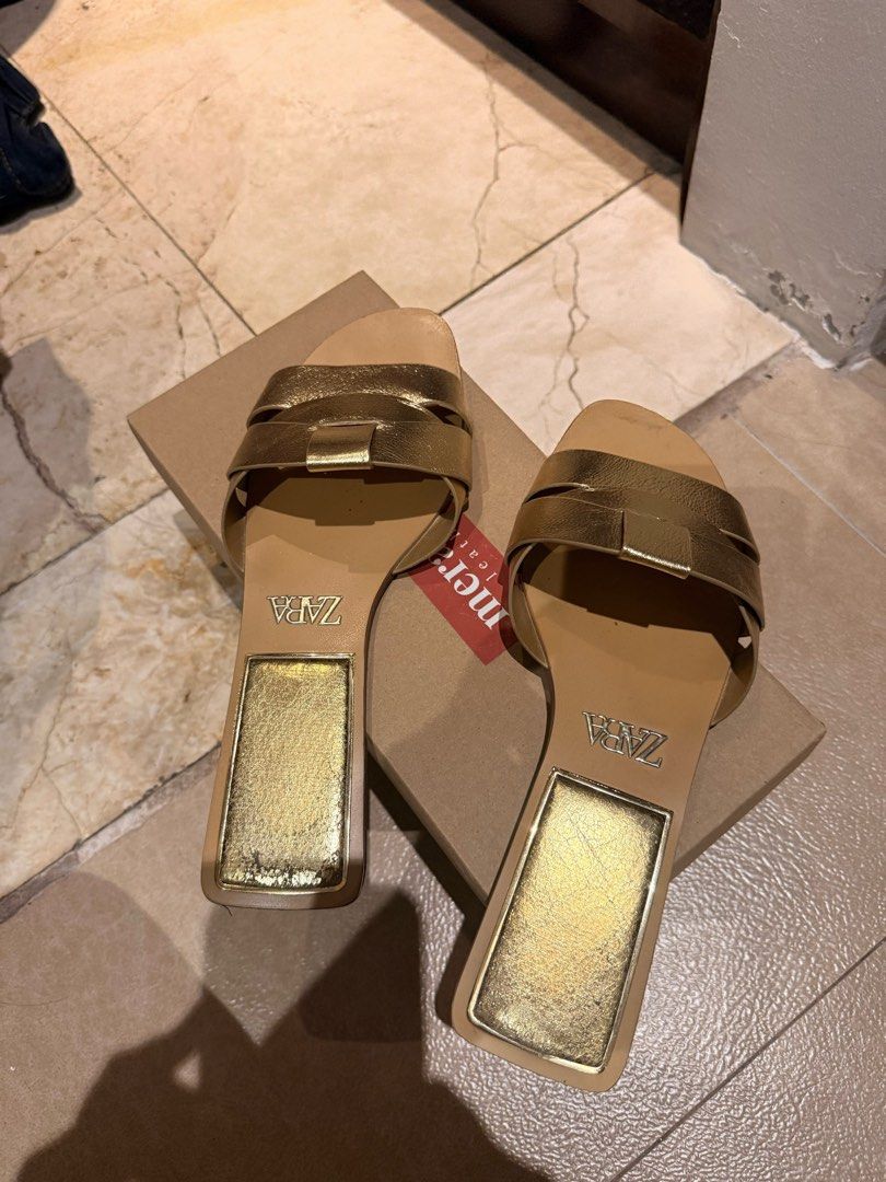 Zara Gold Flat Sandals (Category: Flats & Sandals) located in Pasig City. Submitted by calliemanila (Listing ID 1463579147, Image 2). Description: - Zara gold flat sandals - Light tan sole - Rarely used - free shipping for orders 500 and above :) - Metro Manila, Rizal only .