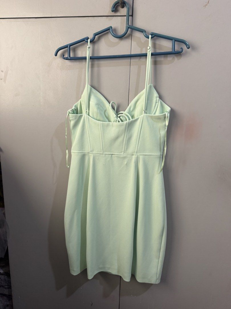 ZARA Light Green Corset Mini Dress (Category: Dresses) located in Valenzuela. Submitted by declutter203 (Listing ID 1463629800, Image 2). Description: - ZARA light green mini dress - Like New - Size: S - Corset-style bodice with tie-up front - Spaghetti straps - Bodycon fit - Ideal for night outs or parties MOP: Gcash/Maribank MOD: J&T or Grab/lalamove Tags: Zara, H&M, Love Bonito, Mango, Bershka, Uniqlo, GU, Topshop.