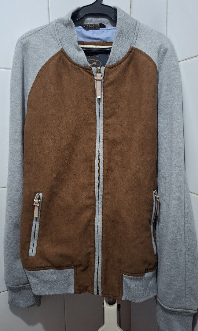 ZARA MAN (Category: Coats, Jackets and Outerwear) located in Manila. Submitted by gentleclosetcollection (Listing ID 1463710905, Image 1). Description: ZARA MAN Faux Suede & Knit Contrast Bomber Jacket (Size L) ​ *Authentic ZARA MAN "Denim Couture" two-tone bomber jacket. Features a soft brown faux suede body with heather grey raglan knit sleeves and trim, full zip closure, and zip pockets. *​Size: EUR L / US L / MEX 42 (Fits true to size / relax