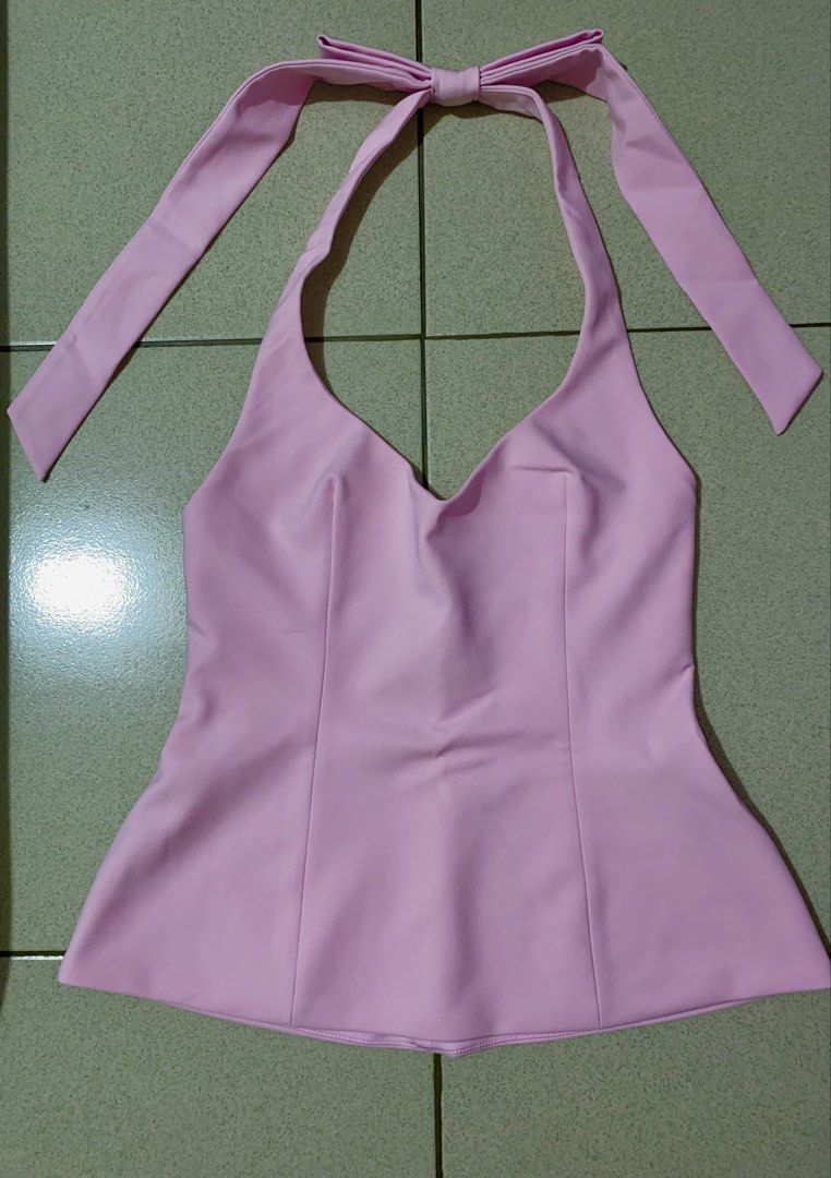 Zara Pink Halter Top 🎀 (Category: Sleeveless) located in Pasay City. Submitted by reyda924 (Listing ID 1463696940, Image 1). Description: Details: - Brand: Zara - Authentic (bought in SM MOA) - Size: Small - Color: Pink - Style: Halter top with back bow detail - Invisible zipper - Only used twice - excellent condition RFS: Changing my wardrobe style Shipping only - buyer will book via Lalamove, angkas, etc. and will shoulder the shipping fee.