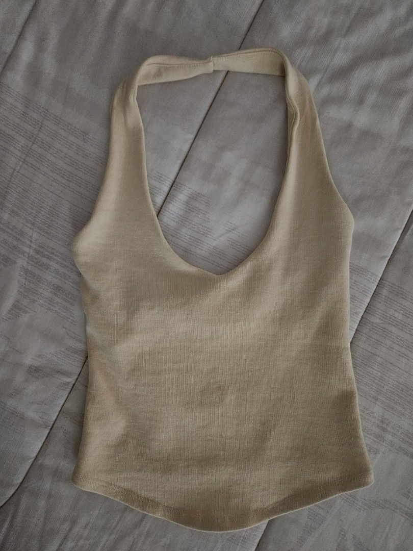Zara Ribbed Halter Neck Crop Top (Category: Sleeveless) located in Muntinlupa City. Submitted by theasells (Listing ID 1463629119, Image 1). Description: Ribbed halter neck crop top from Zara. Super nice butter yellow color! Only worn once. RFS: too loose on me .