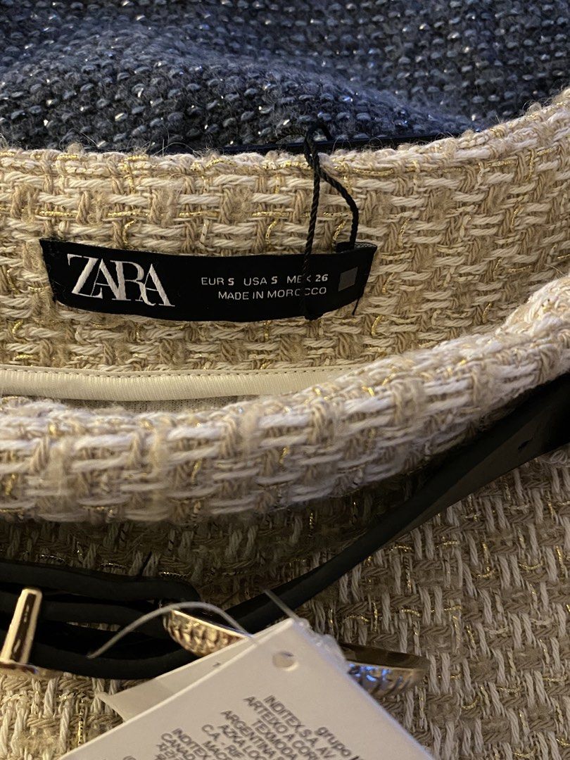 Zara Tweed Skort with Belt (Category: Skirts) located in Quezon City. Submitted by myshoppingaccount24 (Listing ID 1463628628, Image 2). Description: - Zara skort in textured tweed fabric - Beige and gold threads woven throughout - Comes with a black belt with a gold buckle - Size S - Perfect for dressing up or down - Great for any occasion.