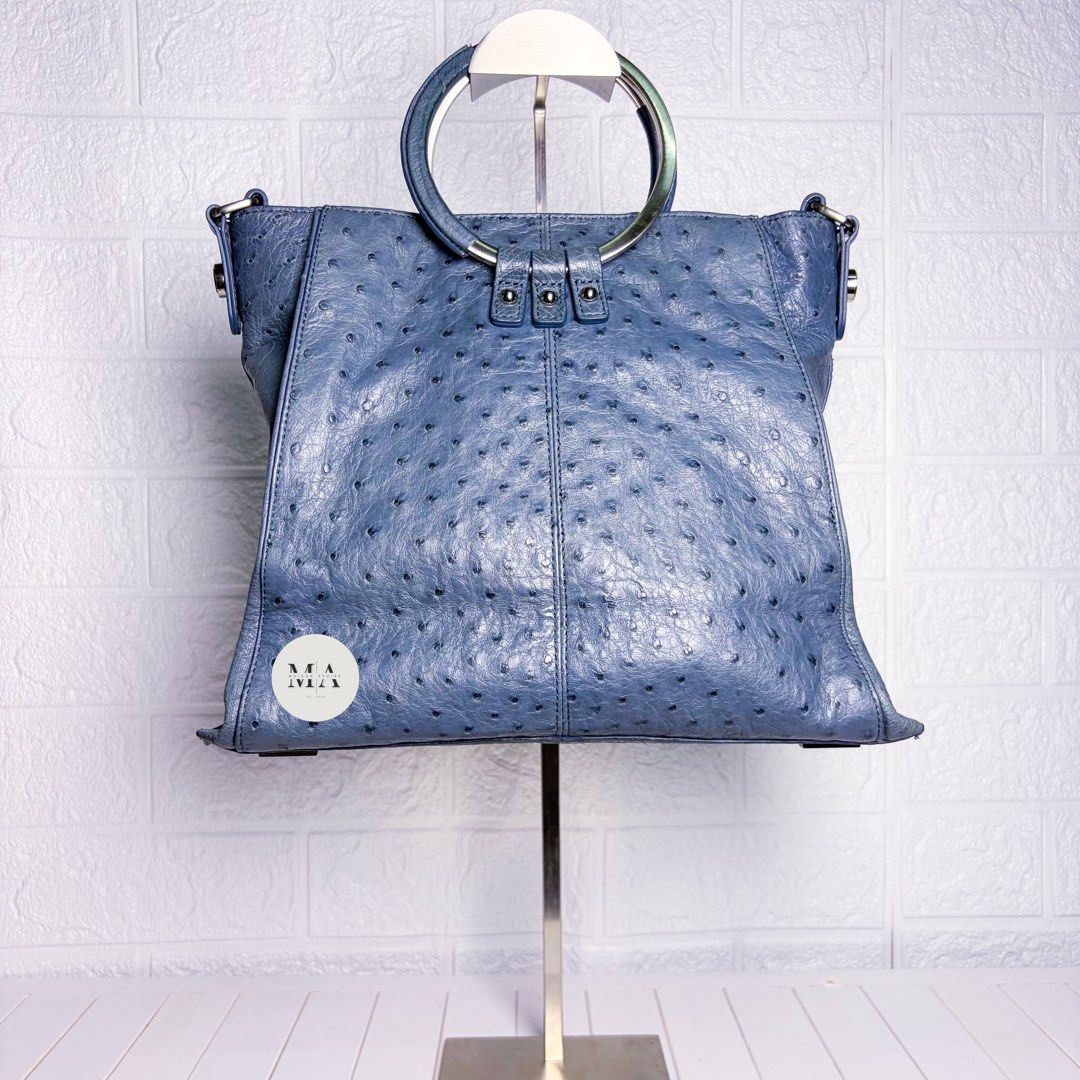 Zarmoi Blue Ostrich Leather Hand Shoulder Bag (Category: Luxury Bags & Wallets) located in Manila. Submitted by maisonavoire (Listing ID 1463590141, Image 2). Description: 𝐙𝐚𝐫𝐦𝐨𝐢 𝐁𝐥𝐮𝐞 𝐎𝐬𝐭𝐫𝐢𝐜𝐡 𝐋𝐞𝐚𝐭𝐡𝐞𝐫 𝐇𝐚𝐧𝐝 & 𝐒𝐡𝐨𝐮𝐥𝐝𝐞𝐫 𝐁𝐚𝐠 𝐃𝐢𝐦𝐞𝐧𝐬𝐢𝐨𝐧𝐬: 30 cm × 13 cm × 25 cm 𝐌𝐚𝐭𝐞𝐫𝐢𝐚𝐥: Genuine Ostrich Leather featuring the distinctive natural quill pattern characteristic of genuine ostrich hide. The naturally rai