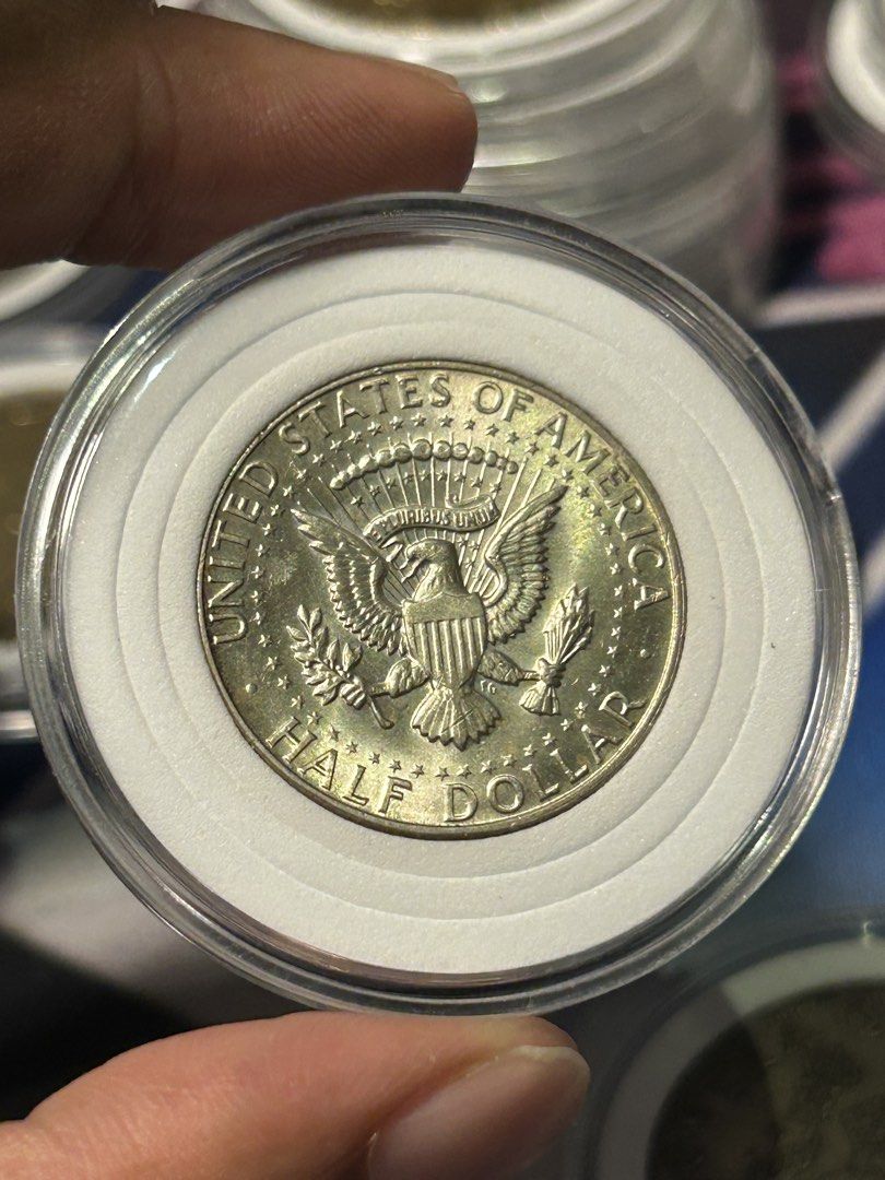 1968 Kennedy Half Dollar Coin (Category: Currency) located in Iloilo. Submitted by jackpot.treasures (Listing ID 1463752390, Image 2). Description: - 1968 Kennedy Half Dollar Coin - Features President John F. Kennedy on the obverse - Presidential Coat of Arms on the reverse - Comes in a protective plastic case - Ideal for coin collectors.
