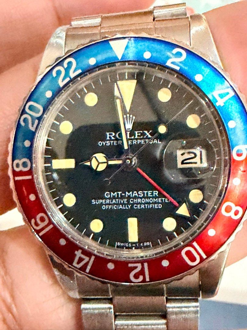 1977 Rolex GMT-Master "Pepsi" 40mm (Ref. 1675) (Category: Luxury Watches) located in Valenzuela. Submitted by macjaymill66221 (Listing ID 1463768332, Image 2). Description: 1977 Rolex GMT-Master “Pepsi” 40mm (Ref. 1675) Model/Reference: 1675 Serial Number: 5028189 (Year: 1977) Movement: Legendary Caliber 1570 Automatic (Hacking Movement, Movt# D692376) Case Back Stamp: 1675 Bezel: Original Period-Correct 1977 Fat-Font Aluminum Pepsi Insert (Bezel