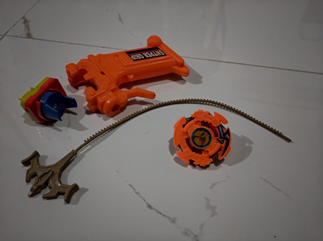 1st Gen Beyblade - Driger V (Category: Action & Battle Toys) located in General Trias. Submitted by mervcorner (Listing ID 1463930396, Image 1). Description: Includes Grip, launcher and ripcord. FOR Display or Collection purpose. Pwede din laruin. FIXED PRICE. RFS: Decluttering Item Location: General Trias, Cavite Delivery thru Lalamove or Jnt (At Buyer's Expense) Contact if interested..