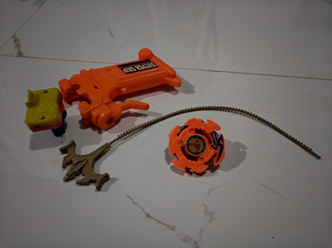 1st Gen Beyblade - Driger V (Category: Action & Battle Toys) located in General Trias. Submitted by mervcorner (Listing ID 1463930396, Image 2). Description: Includes Grip, launcher and ripcord. FOR Display or Collection purpose. Pwede din laruin. FIXED PRICE. RFS: Decluttering Item Location: General Trias, Cavite Delivery thru Lalamove or Jnt (At Buyer's Expense) Contact if interested..