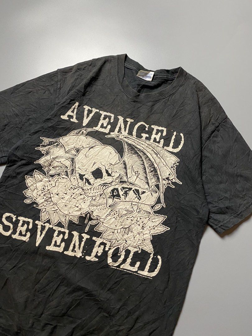 2008 Avenged Sevenfolds Tee Size Medium (Category: Tshirts & Polo Shirts ) located in Cebu City. Submitted by maicoh230 (Listing ID 1463869860, Image 2). Description: 2008 Avenged Sevendfold Tee on a hanes heavyweight tag ▫️ Condition: 9/10 ▫️ Color: 8/10 ▫️ Size: M ▫️ Dimensions: W19 L26 ▫️ Flaw/s: Unevend Fade / Need Wash 🏷️ 650.