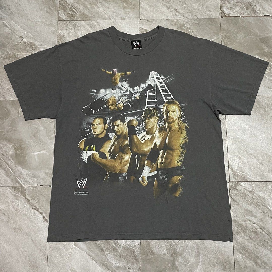 2008 WWE Superstars "Hybrid" Mega Print Tee (Category: Tshirts & Polo Shirts ) located in Bacoor. Submitted by thrift2dough (Listing ID 1463862016, Image 1). Description: 2008 WWE Superstars "Hybrid" Mega Print Tee Size: XL Condition: 9/10 Issue: 2 holes (check 2 last picture) Dimensions Width: 24 in Length: 30 in Price: 2,500 shipped.