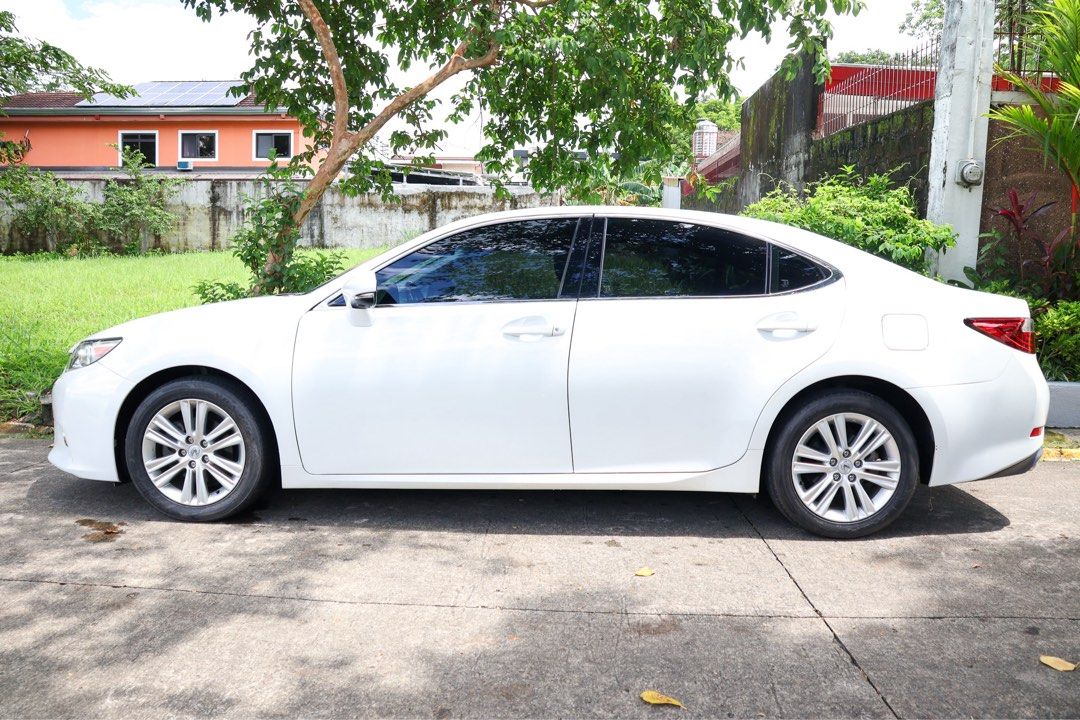 2014 Lexus ES350 Auto (Category: Used Cars) located in Quezon City. Submitted by emcpradoautoinc (Listing ID 1463771036, Image 3). Description: 2014 Lexus ES350 6-speed automatic transmission 3.5L V6 gas engine 54,000 kms mileage Ending 9 (Friday coding) Php 695,000 Price is negotiable Major credit cards accepted Open for trade-in Viewing and test drive at 47 Moses St., Filinvest 2 Subdv., Brgy. Bagong Silangan, Quezon City PM if interested! Or s