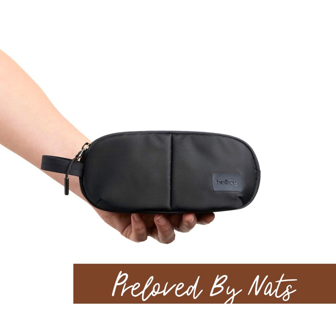(-20%) Bellroy Laneway Sunglasses Pocket, Ink (Category: Sunglasses & Eyewear) located in Pasig City. Submitted by prelovedbynatsmnl (Listing ID 1461235210, Image 1). Description: Retail Price - $35 / ₱2,250 Preloved Price - ₱1,800 (Fixed) Purchase Date - Jul 2026 / 2 months Purchased At - Bellroy dot com FEATURES - Split internal section fits 2 pairs of glasses - Padded protection with soft lining - Smooth running zip - Has an internal slip pock