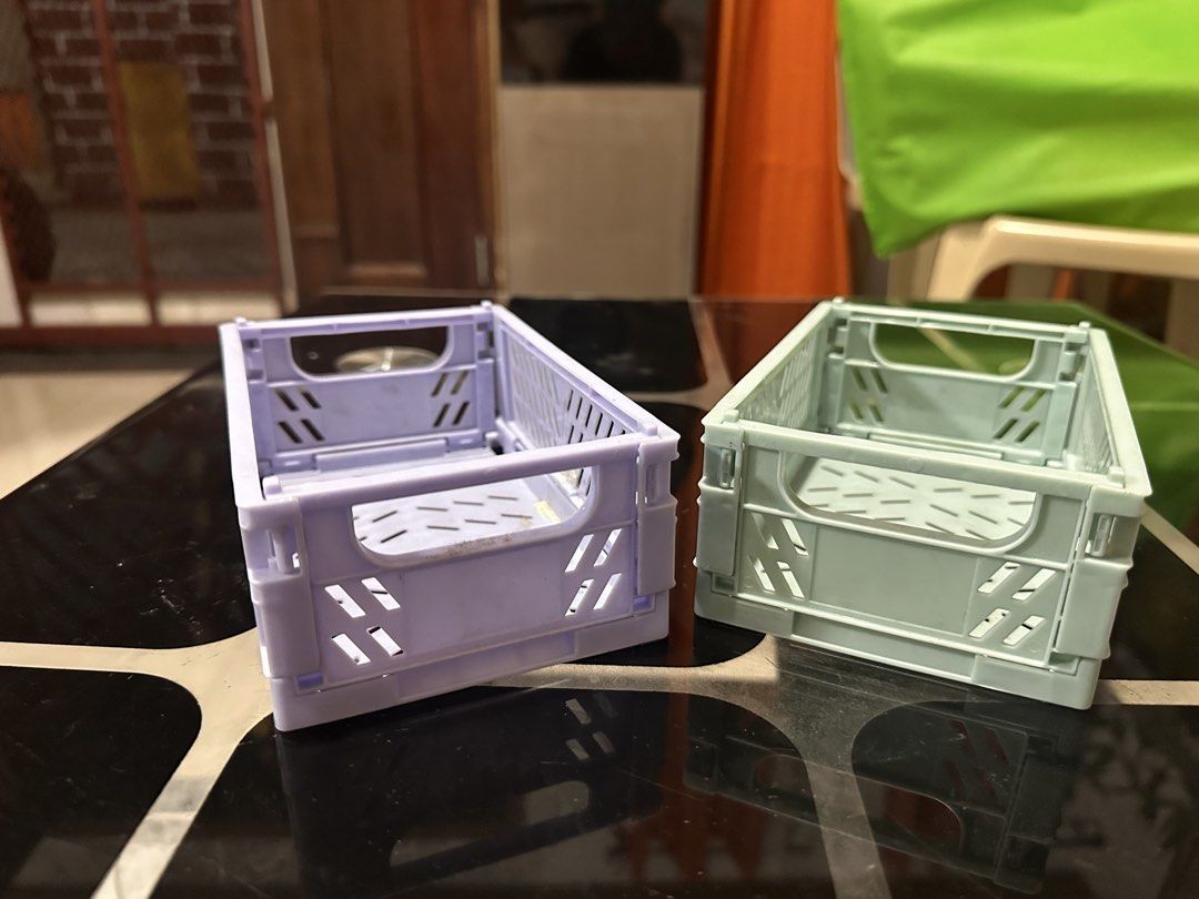 2 Foldable Storage Crates - Pastel Purple & Mint Green (Category: Storage Boxes & Baskets) located in Manila. Submitted by zuripot0726 (Listing ID 1463841146, Image 2). Description: - Set of 2 foldable storage crates: 1 pastel purple, 1 mint green. - Stackable design for efficient organization. - Ideal for small items on desks, shelves, or any cluttered space. - Folds flat for convenient storage when not in use. - Approximate dimensions when open