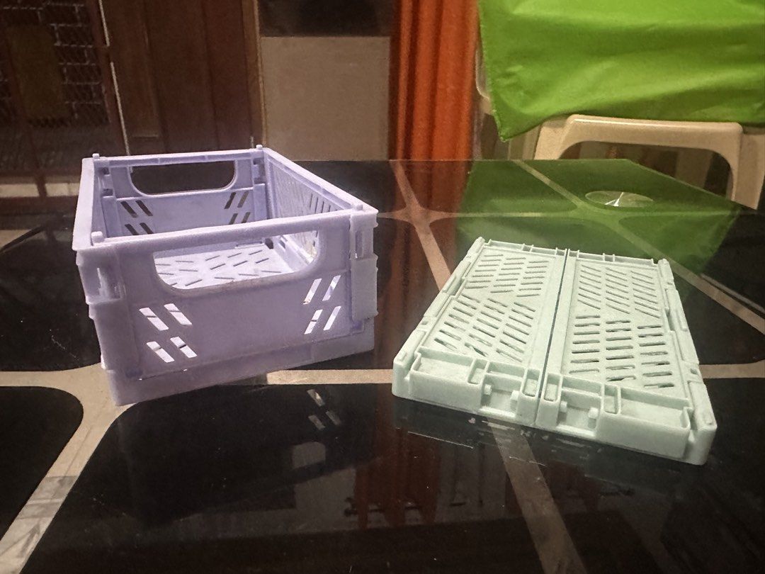 2 Foldable Storage Crates - Pastel Purple & Mint Green (Category: Storage Boxes & Baskets) located in Manila. Submitted by zuripot0726 (Listing ID 1463841146, Image 1). Description: - Set of 2 foldable storage crates: 1 pastel purple, 1 mint green. - Stackable design for efficient organization. - Ideal for small items on desks, shelves, or any cluttered space. - Folds flat for convenient storage when not in use. - Approximate dimensions when open