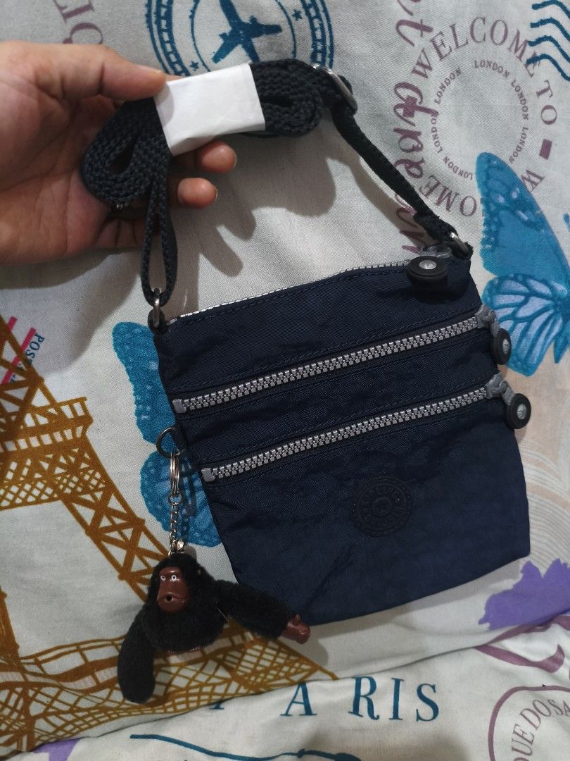 🟣 Kipling mini sling cute blue simple minimalist cellphone sling small (Category: Cross-body Bags) located in Cebu City. Submitted by cherry_05 (Listing ID 1463925626, Image 2). Description: 🎀New Sale🎀 ♡ colors may vary due to lighting ♡ Please make do with the pictures provided. I do not model items. ♡ preloved po so please manage your expectations. ♡ Please ask all questions prior to making an offer as all sales are final. ♡ First to pay own