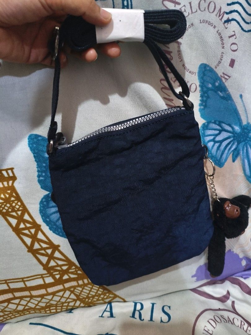🟣 Kipling mini sling cute blue simple minimalist cellphone sling small (Category: Cross-body Bags) located in Cebu City. Submitted by cherry_05 (Listing ID 1463925626, Image 3). Description: 🎀New Sale🎀 ♡ colors may vary due to lighting ♡ Please make do with the pictures provided. I do not model items. ♡ preloved po so please manage your expectations. ♡ Please ask all questions prior to making an offer as all sales are final. ♡ First to pay own