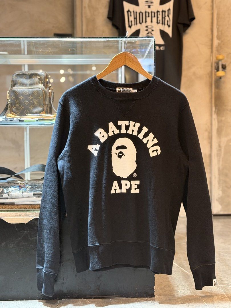 A Bathing Ape BAPE Crewneck Sweatshirt (Category: Coats, Jackets and Outerwear) located in Pasig City. Submitted by letmethrift88 (Listing ID 1463848447, Image 1). Description: - Brand: A Bathing Ape (BAPE) - Item: Crewneck Sweatshirt - Color: Black - Logo: Iconic Ape Head - Size: Medium (M) - Material: 100% Cotton - Style: Casual wear.