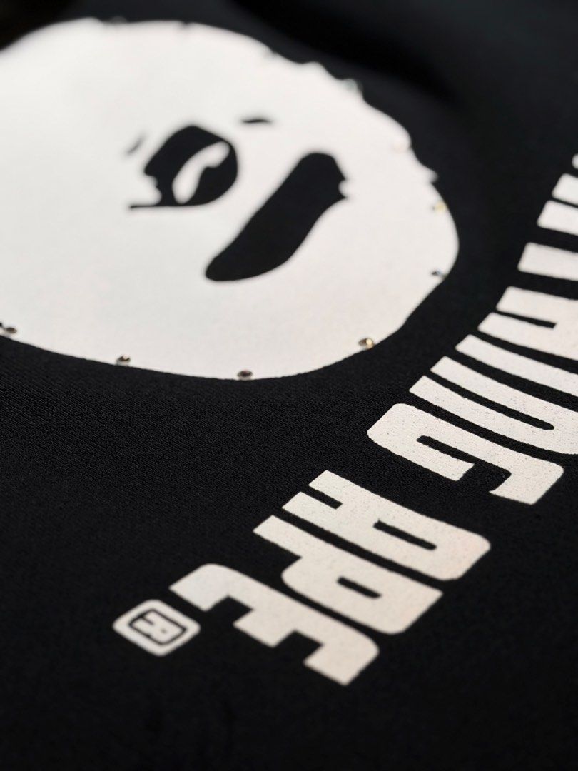 A Bathing Ape BAPE STA Crewneck Sweatshirt Black (Category: Coats, Jackets and Outerwear) located in Pasig City. Submitted by letmethrift88 (Listing ID 1463849896, Image 3). Description: - Color: Black - Brand: A Bathing Ape (BAPE) - Style: Crewneck Sweatshirt - Size: L - Features: Iconic BAPE STA logo graphic on front - Text Details: "A BATHING APE" and "APE SHALL NEVER KILL APE" - Condition: Great for any streetwear collection.