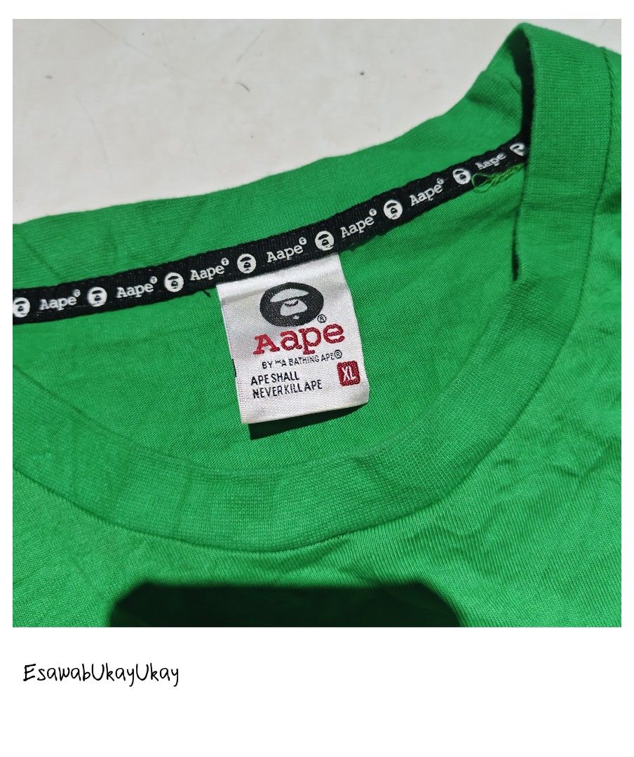 Aape Big Head Shirt (Category: Activewear) located in Lucena. Submitted by esawabthriftshopatbp (Listing ID 1463822954, Image 2). Description: Aape Big Head Shirt Size XL On Tags Width -21 Length-26 Excellent Condition Need Wash.