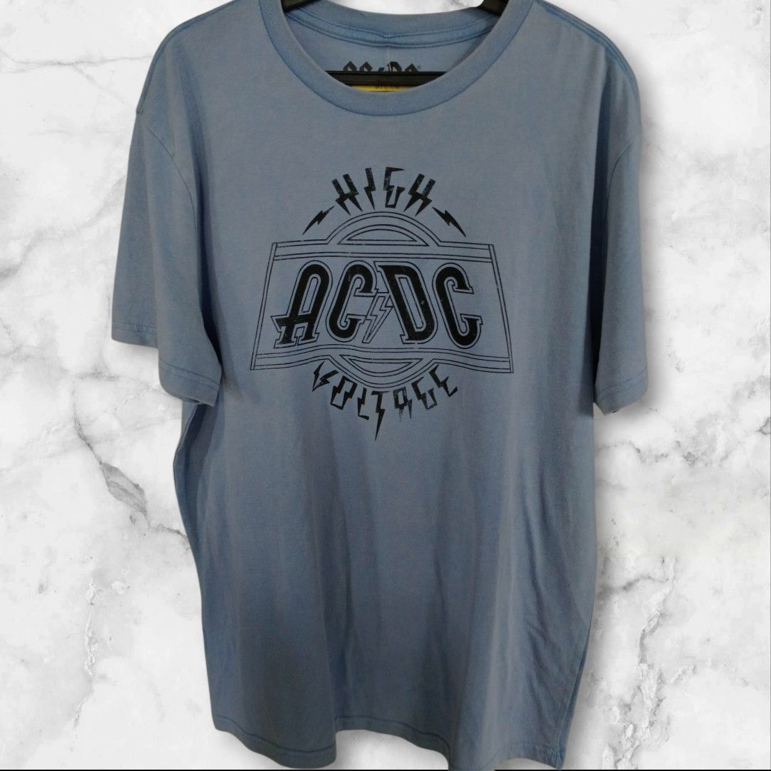 ACDC High Voltage T-Shirt (Category: Tshirts & Polo Shirts ) located in Manila. Submitted by janeneb (Listing ID 1463752816, Image 1). Description: - Classic Blue ACDC T-Shirt - Features iconic 'High Voltage' graphic - Perfect for any ACDC fan - Comfortable and relaxed fit.