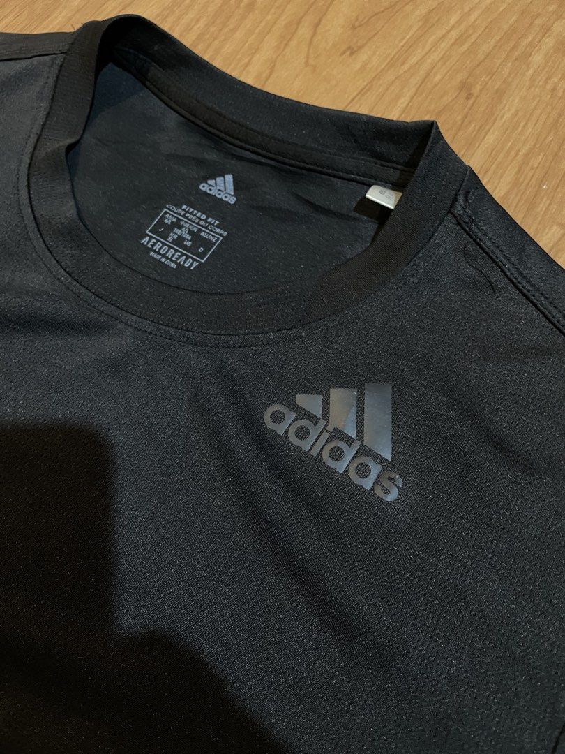 Adidas Aeroready 3-Stripes Tee (Category: Activewear) located in Bacolod City. Submitted by maxpeynthrift (Listing ID 1463787499, Image 3). Description: Size large fit to medium W 19.5 L 26.5 Good condition Issue scratch near at hem Good for running , gym wear , pickleball.