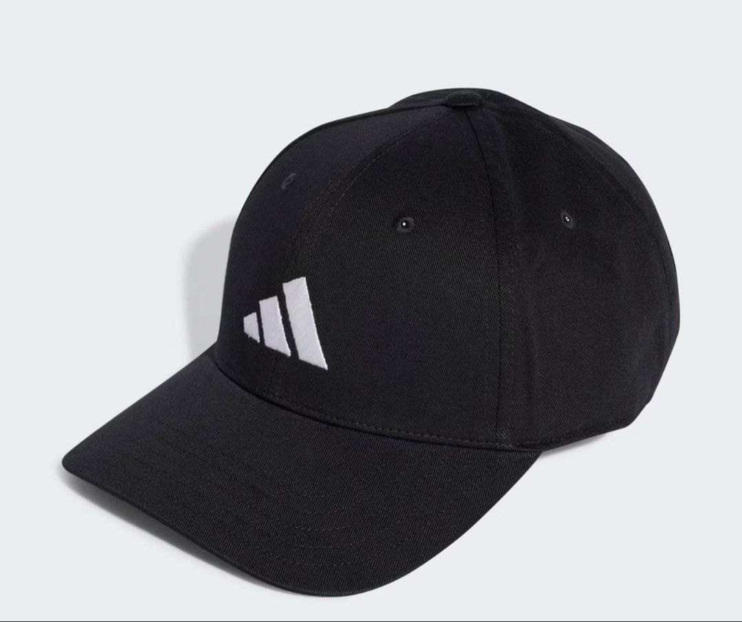 Adidas BB Cap Cot NL Black (Category: Caps & Hats) located in Pasay City. Submitted by szepter (Listing ID 1463747179, Image 1). Description: - Classic black Adidas cap - Iconic white three-bar logo embroidered on front - One size fits most - Adjustable strap at the back for a comfortable fit - Made in Vietnam - Perfect for everyday wear or sports.