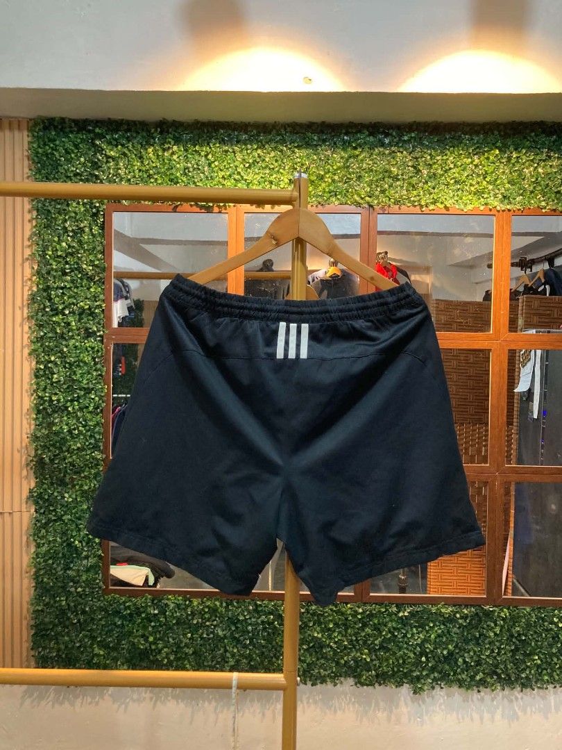 Adidas Black Shorts with White Stripes (Category: Shorts) located in Trece Martires City. Submitted by djaothriftshop (Listing ID 1463839692, Image 2). Description: - Black Adidas shorts - Elastic waistband with drawstring - White stripe detail on sides and back - Ideal for sports or casual wear - Comfortable fit.