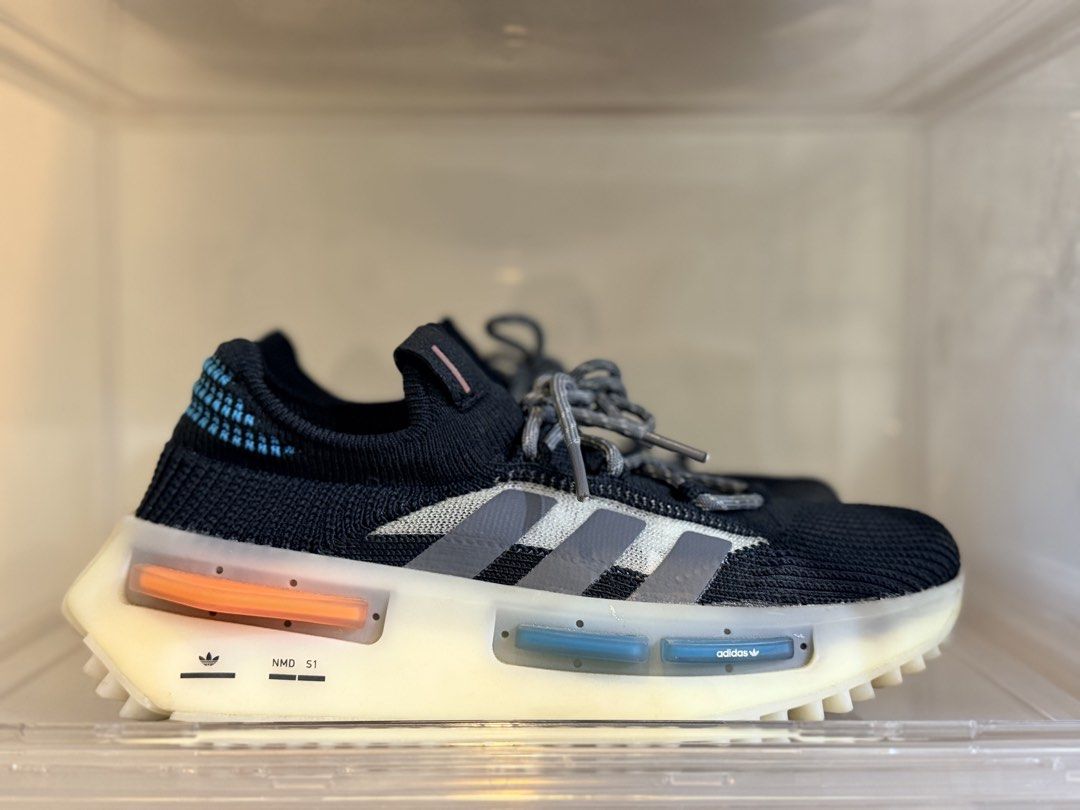 Adidas NMD (Category: Sneakers) located in Pasig City. Submitted by silent.finders.keepers (Listing ID 1463855965, Image 2). Description: Adidas NMD_S1 ‘Black Teal Orange’ FZ5706 Men’s/Women’s Shoes Owner’s foot size is 5.5. Official Retail (Alternative Colorways): Standard inline NMD S1 releases generally list between ₱9,000 and ₱15,000 depending on the specific edition.