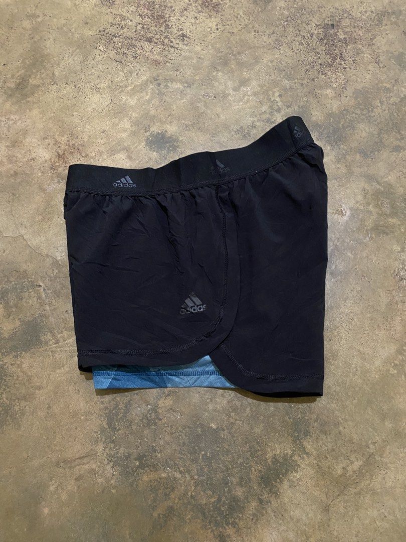 Adidas running shorts (Category: Shorts) located in Tabaco. Submitted by centthrif55361 (Listing ID 1463816931, Image 2). Description: Adidas running Large on tag fit W:26-32 L:10-11 New condition Color rate 10/10 No issue .