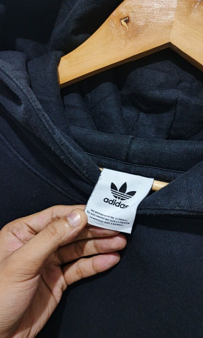 Adidas stringless Pullover hoodie (Category: Coats, Jackets and Outerwear) located in Batangas. Submitted by lelethrift.com (Listing ID 1463887652, Image 3). Description: Adidas heavy weight stringless pullover hoodie Size: Large best fit 9/10 color rate No issue, complete tags with washtag and qr heavy weight and double lined hood ribbings and hem solid condition pa 400+50 pesos sf.
