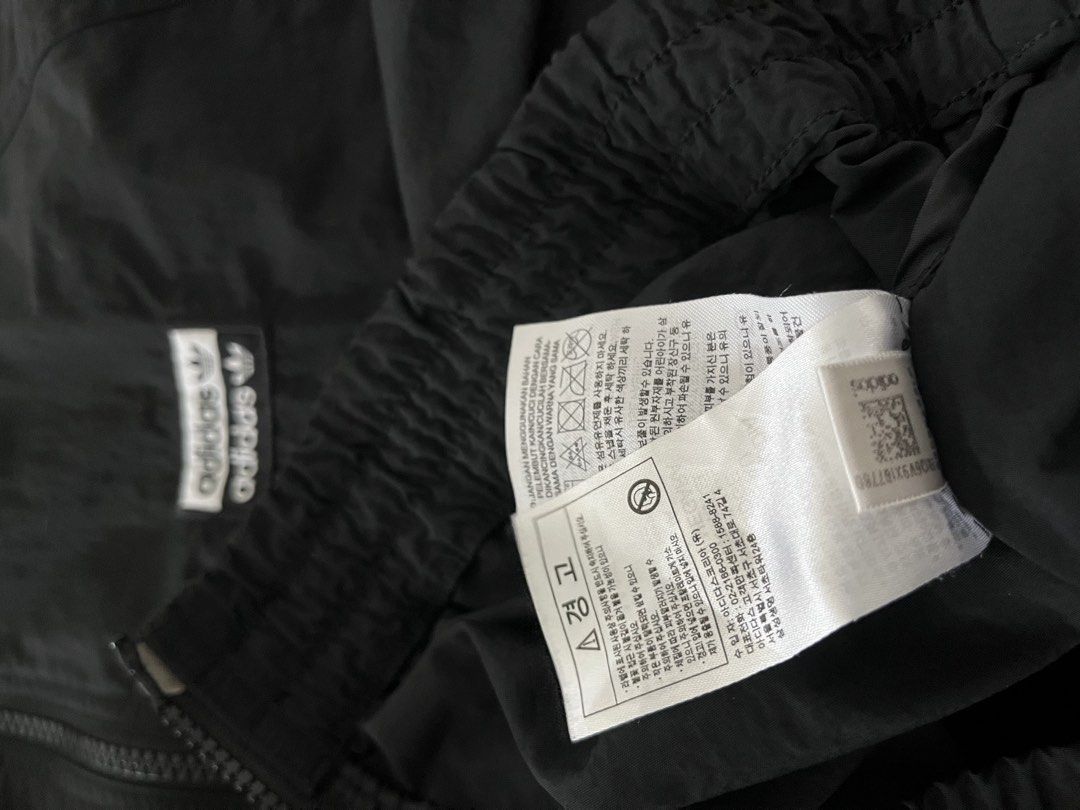 Adidas Track Jacket Black White Tape Logo (Category: Coats, Jackets and Outerwear) located in Mandaluyong City. Submitted by unomarcelo001 (Listing ID 1463811685, Image 2). Description: W21 L25 good as new - Classic black Adidas track jacket - Iconic white Adidas tape logo down the sleeves - Full zip closure - Ribbed cuffs and hem - Ideal for casual wear or sports - Size: S (175/92A) price still negotiable for sure buyers .