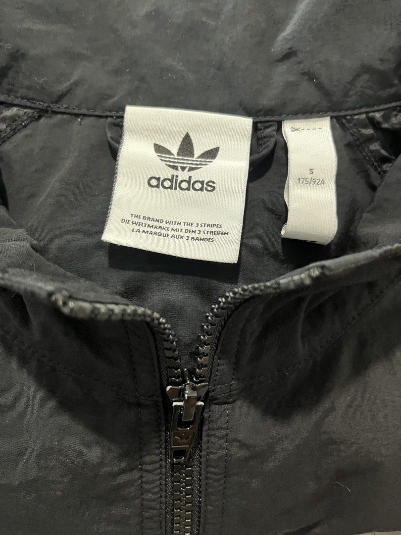 Adidas Track Jacket Black White Tape Logo (Category: Coats, Jackets and Outerwear) located in Mandaluyong City. Submitted by unomarcelo001 (Listing ID 1463811685, Image 3). Description: W21 L25 good as new - Classic black Adidas track jacket - Iconic white Adidas tape logo down the sleeves - Full zip closure - Ribbed cuffs and hem - Ideal for casual wear or sports - Size: S (175/92A) price still negotiable for sure buyers .