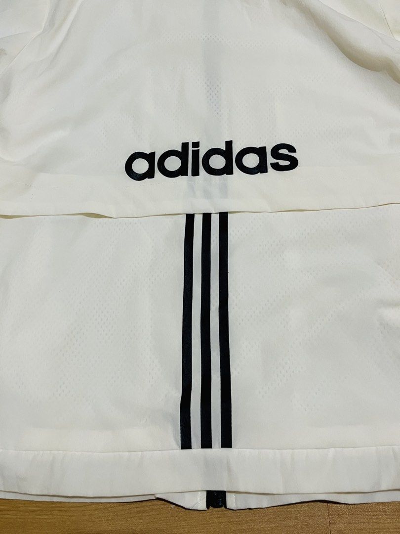 Adidas Windbreaker Jacket - White (Category: Coats, Jackets and Outerwear) located in Castillejos. Submitted by prvsly.ph (Listing ID 1463932898, Image 3). Description: * Best Fit: L * Width: 52 cm * Length: 62 cm * Color Rate: 9.5 * Like New Condition * Best Fit: L * Width: 52 cm * Length: 62 cm * Color Rate: 9.5 * Like New Condition PRICE: ₱500.00 + SF 🧾 MOP: Cash/GCash/BDO 📦 We Ship Nationwide via J&T 📍Castillejos, Zambales 🧾 MOP: Cash/GCa