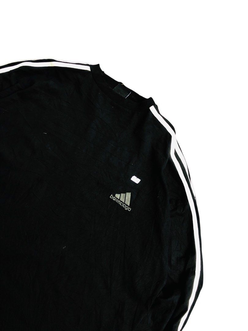 Adidas x Balenciaga Distress (Category: Coats, Jackets and Outerwear) located in Angeles City. Submitted by wwdrip (Listing ID 1463757830, Image 1). Description: Balenciaga x Adidas Distress Longsleeve♻️ •Width : 24 •Length : 30 •Size : XL •Color rate : 9.7/10 •Condition : excellent to as new •no issue ₱1,500.